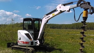Аренда экскаватора погрузчика с ямобуром в Гатчина цена от 1573 руб